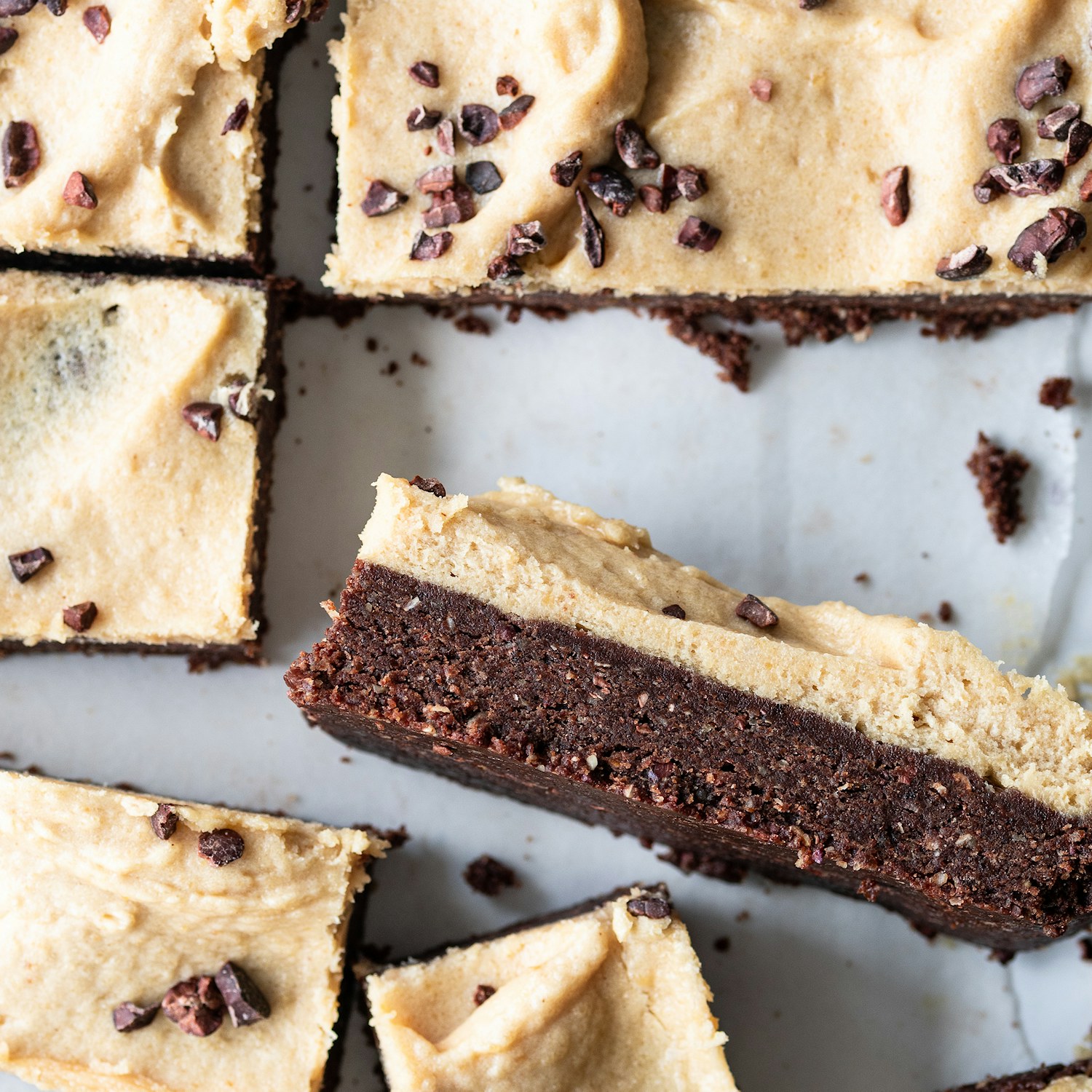 Raw Pecan Crunch Brownies with Peanut Butter Frosting