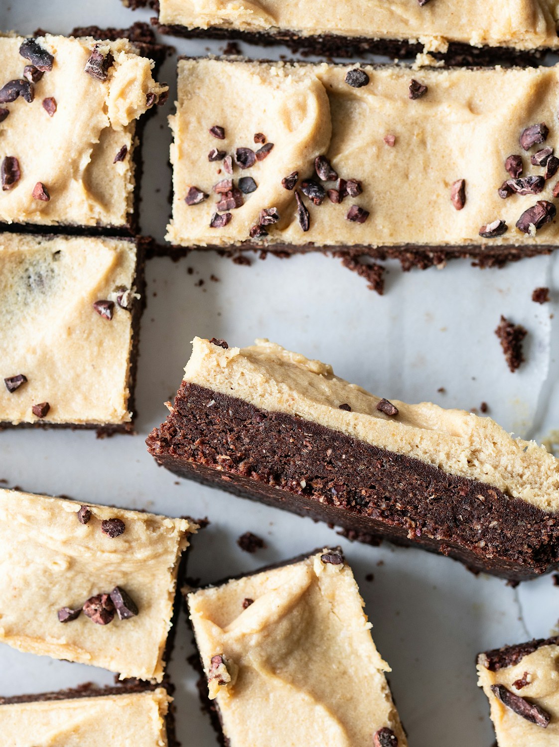 Raw Pecan Crunch Brownies with Peanut Butter Frosting