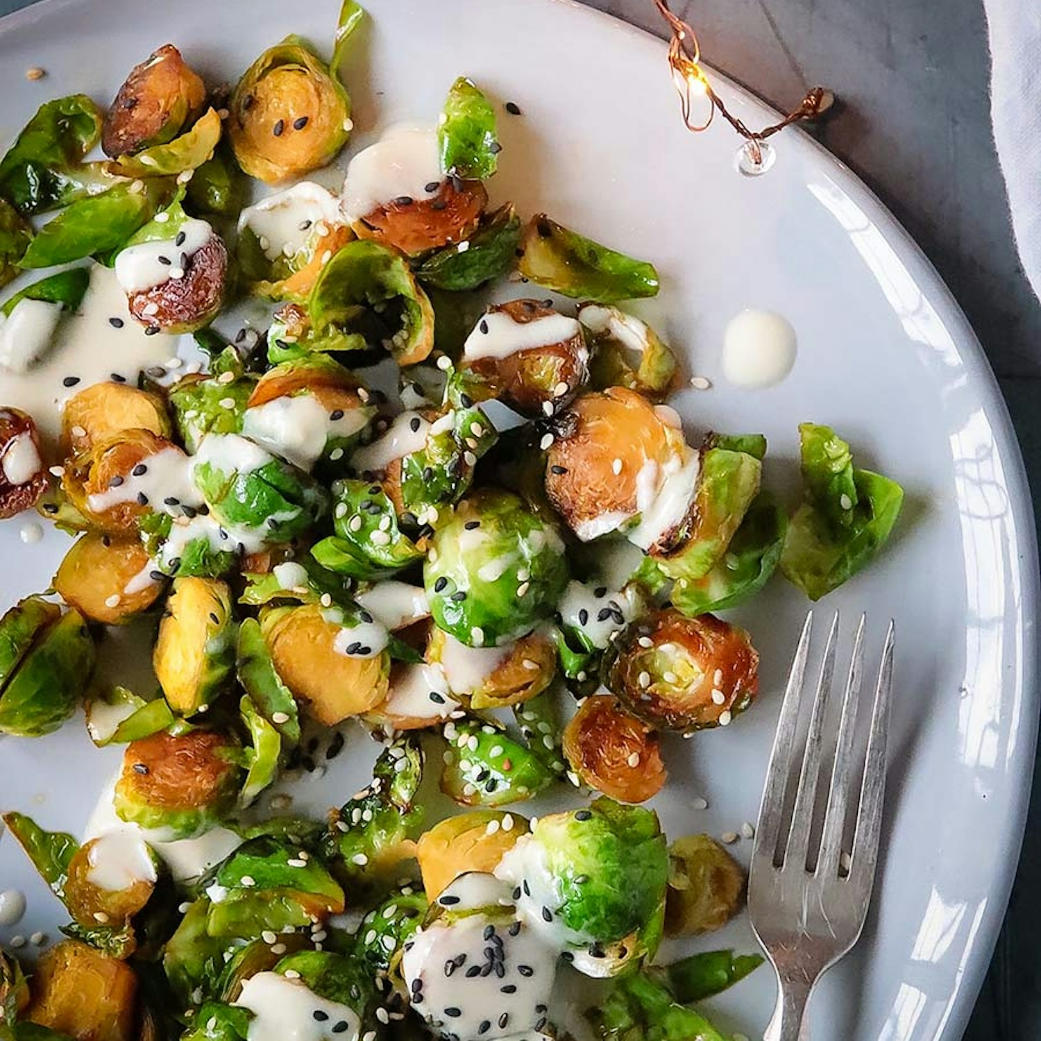 Sauteed Sprouts with Tahini and Maple Dressing